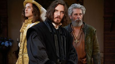 three actors as Raphael; Michelangelo; Da Vinci. Michelangelo is in the middle looking to the screen and Raphael and Da Vinci are looking away from the camera