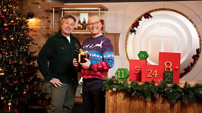 John Torode and Gregg Wallace in a festively decorated MasterChef kitchen