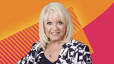 Headshot of Elaine Paige in front of orange and red geometric branding for BBC Radio 2.