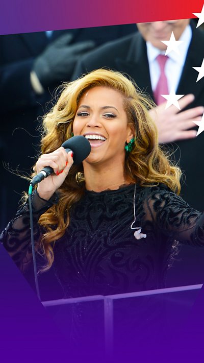 Singer Beyonce Knowles, dressed in black singing the Star-Spangled Banner at President Obama's 2013 inauguration