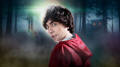 Image of Danny Robins wearing a red coat in a wood overlaid with an Uncanny logo