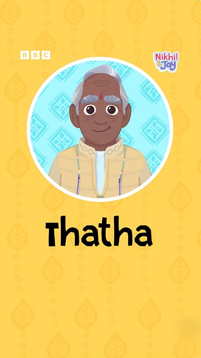 An elderly south Indian man with busy eyebrows and grey hair, smiling peacefully.