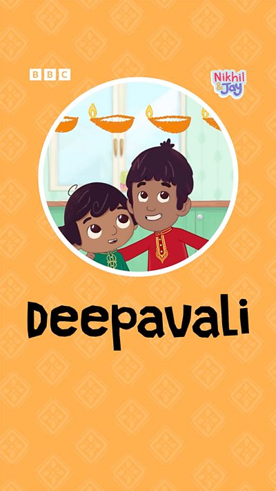 Two south Indians boys, one shorter and one taller, smile and look up at a string of lamps above their head.