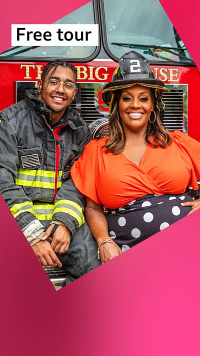 Mother and son, Alison and Aiden Hammond, pose in front of a red fire engine