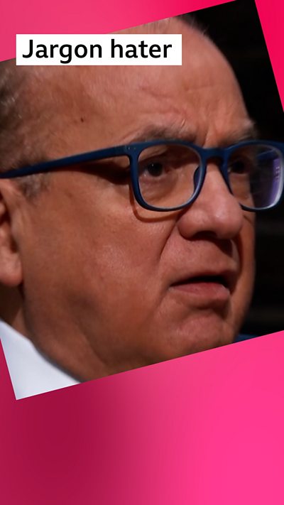 A man with glasses - Touker Suleyman - has a shocked expression. Label: Jargon hater