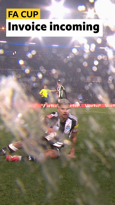 Newcastle United's Bruno Guimaraes behind a smashed camera lens