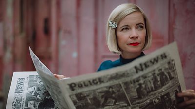 Lucy Worsley reads an old-fashioned newspaper