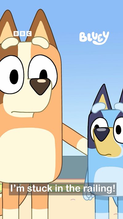 Chilli and Bluey watch as Bingo yells "I'm stuck in the railing!"