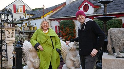 Tara-Lynne O'Neill and Paddy Raff visit Moy in County Tyrone and are stood in an outdoor shop selling garden stone ornaments
