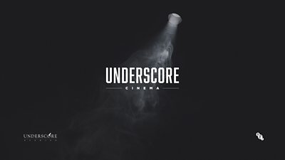The text underscore cinema under a smokey spotlight