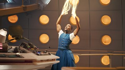 The doctor reaches the ceiling while the regeneration energy flows from their hands
