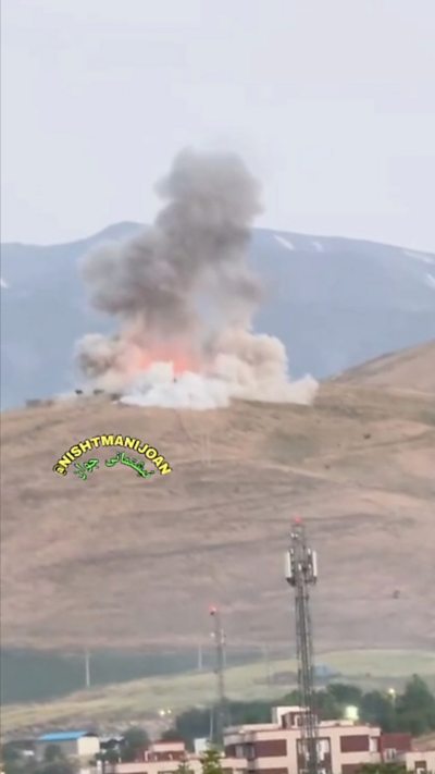 Smoke from large explosion on the horizon