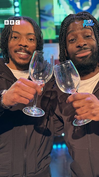 Big Manny and Big Danny cheersing wine glasses