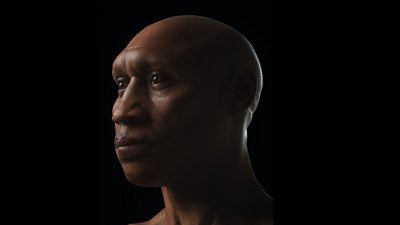 A reconstructed face of a human with dark skin and dark brown eyes against a black background.  