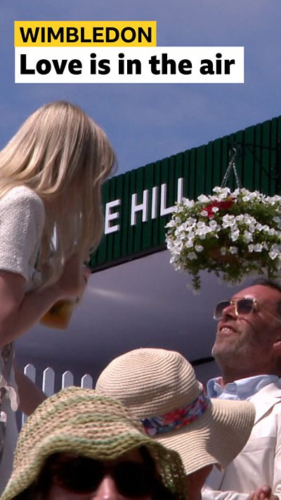 spectator proposes to girlfriend in the crowd