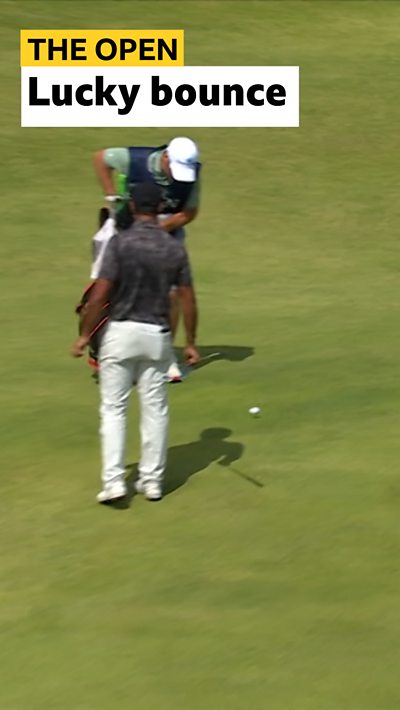 Aaron Rai and caddie