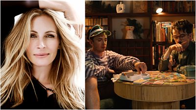 Left: A headshot of Julia Roberts, smiling with one arm stretched across the top of her head. Right: Alex Lawther and Laurie Kynaston as Leonard and Hungry Paul, sitting playing a board game together.