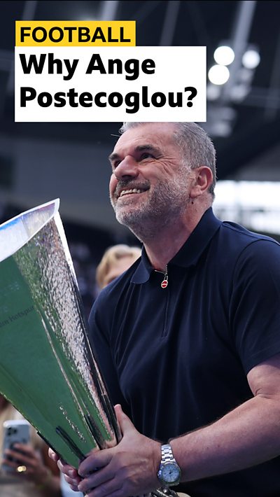 Ange Postecoglou with the Europa League trophy in his hands.