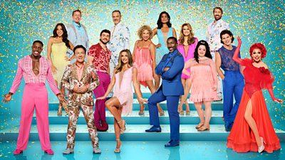 The cast of Strictly Come Dancing 2025 post on a series of bight blue/green steps, wearing glamorous ballroom and latin dresses, suits and shirts.