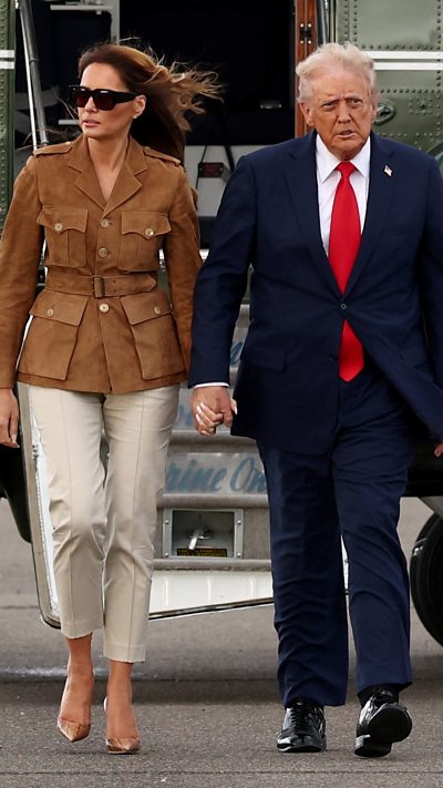 President and first lady board Air Force One