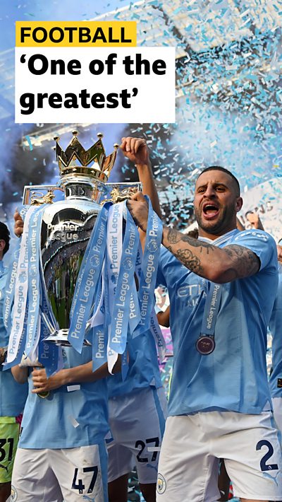 Kyle walker lifting the Premier League trophy