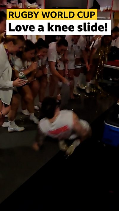 Hannah Botterman kneeslide celebration in front of the rest of the England team