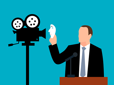 Photo of a person holding a mask in front of a camera