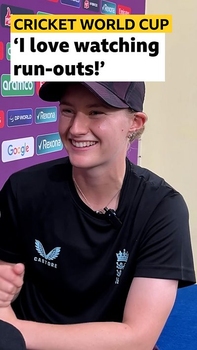 England spinner Charlie Dean smiling at the camera in a black England training top.