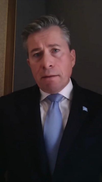 Tom Fletcher wearing blue tie and suit