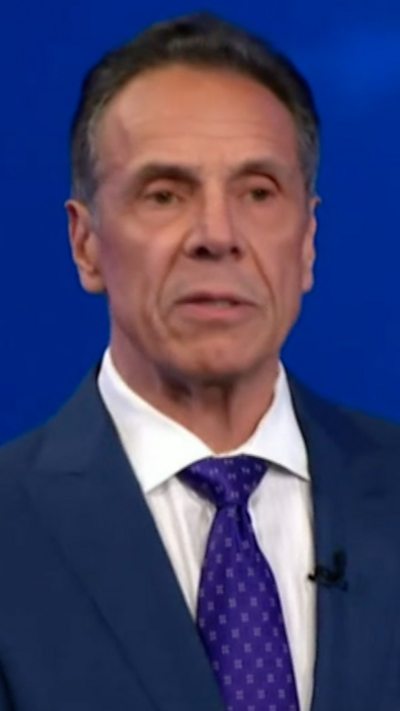 Andrew Cuomo is talking to the press.