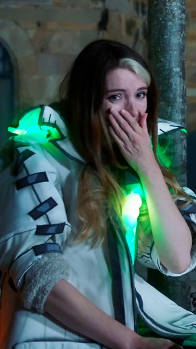 LittleJem laughs at Joel and Shini's DIY halloween costumes.