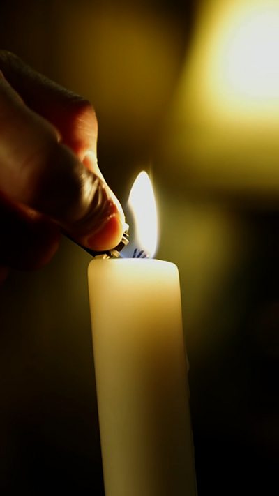 A candle being lit.