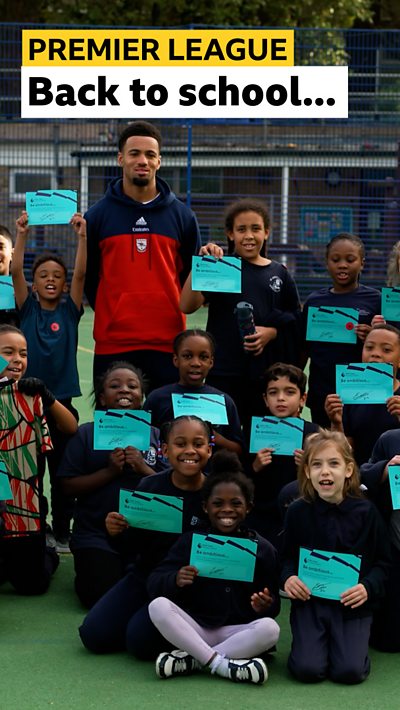 Ethan Nwaneri and local school children