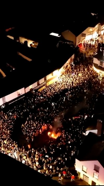 Drone footage shows glow of tar barrels in Ottery St Mary