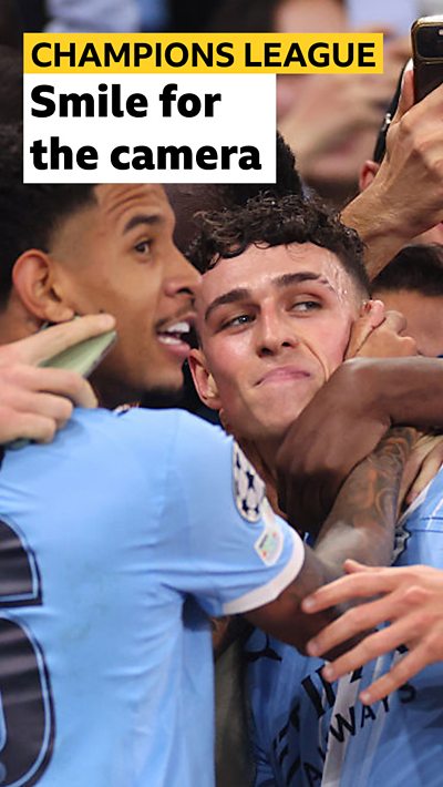 Phil Foden taking a selfie with the fan