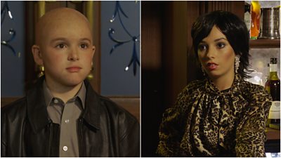 Two children dressed as EastEnders characters Phil Mitchell and Kat Slates