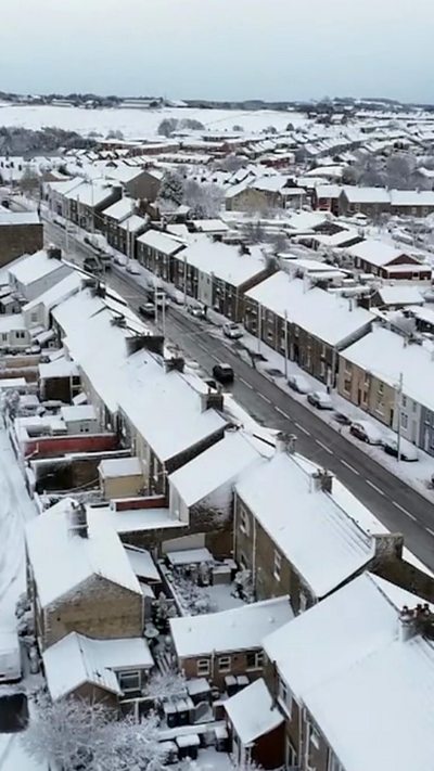 Rows of snow covered houses
