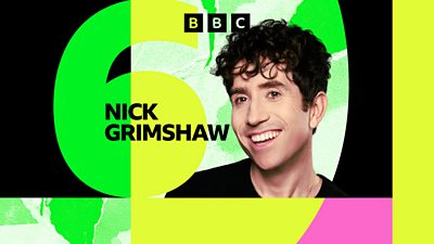 Picture of Nick Grimshaw in front of yellow, pink and green branded graphics for BBC Radio 6 Music.