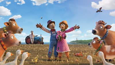Two animated scarecrows stand in a field arm in arm, celebrating their wedding while a man leaning against a tractor in the background, a small crab, a fucking, some geese and cows watch on