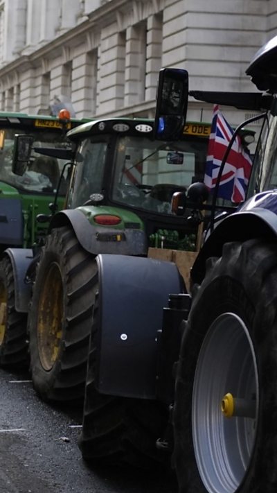 Tractors line street