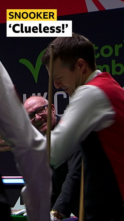 Snooker players and referee