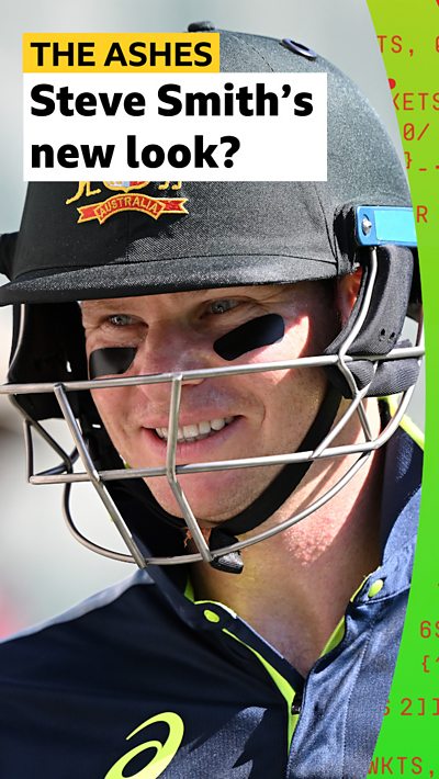Australia captain Steve Smith wearing a helmet and black shades under his eyes.