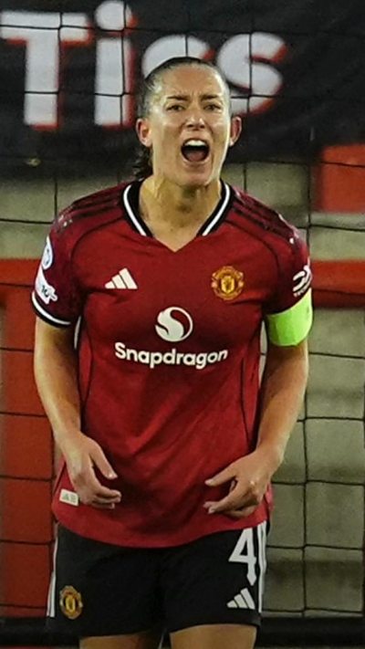 Maya Le Tissier, wearing a football shirt.