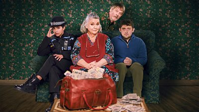 Key art for Can You Keep A Secret. Three people sit on a sofa in front of a large bag overflowing with cash. A man hides behind the sofa in clothing that blends into the wallpaper.