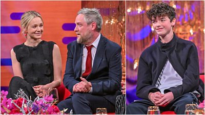 A collage of images. On the left, a a man and woman (Carey Mulligan and Tim Key) sit side by side on a red sofa and she laughs as he tells a story. On the right, a young man sits on a red sofa, smiling at someone just off camera.