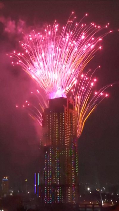Fireworks exploding around Old Mutual Tower in Nairobi