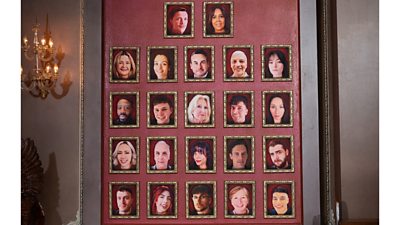 Portraits of all 22 Traitors contestants hang on the wall in the castle's breakfast room