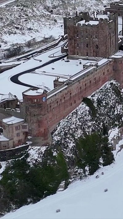 Bamburgh Castle covered in snow