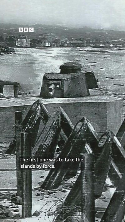 A black and white still showing German beach defences in Jersey