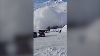 Watch: Artificial avalanche tumbles down Russian mountain - BBC News